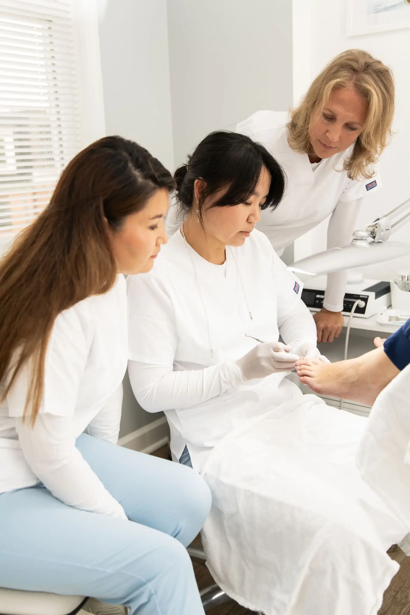 Specialist performing a medical pedicure during training at MedPedicure Academy USA